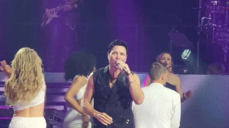 a man singing into a microphone