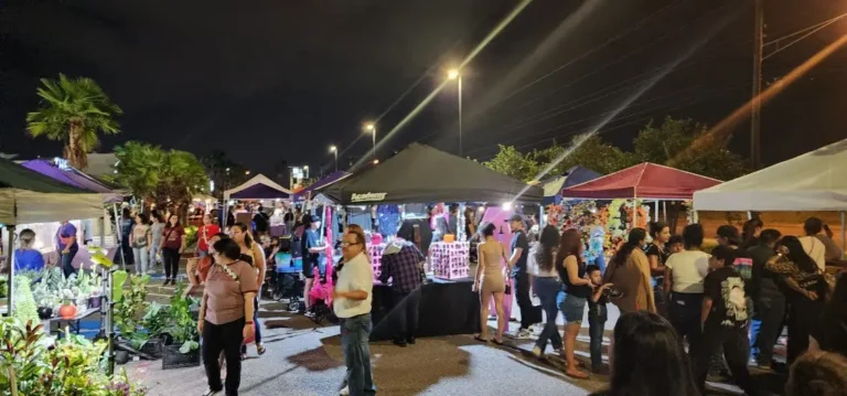 a group of people at a street market