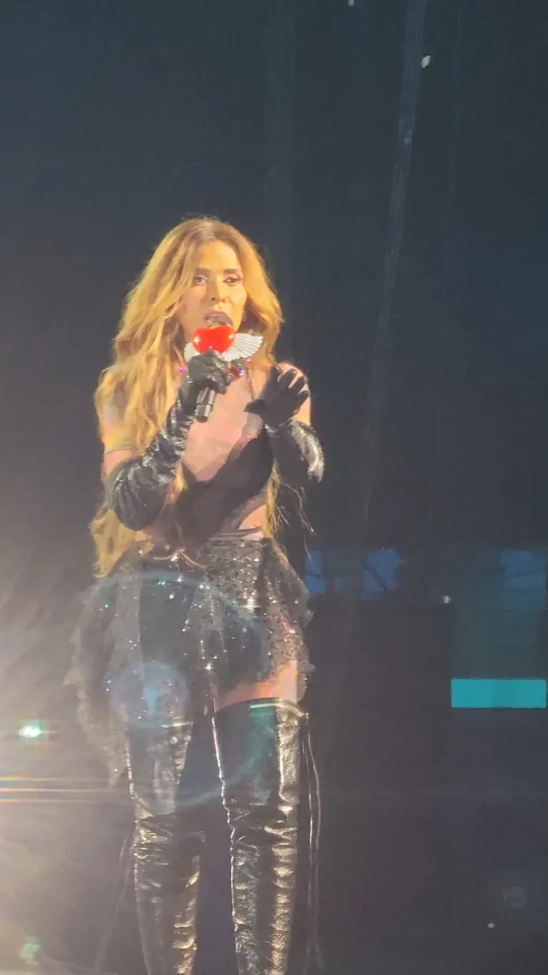 a woman holding a microphone