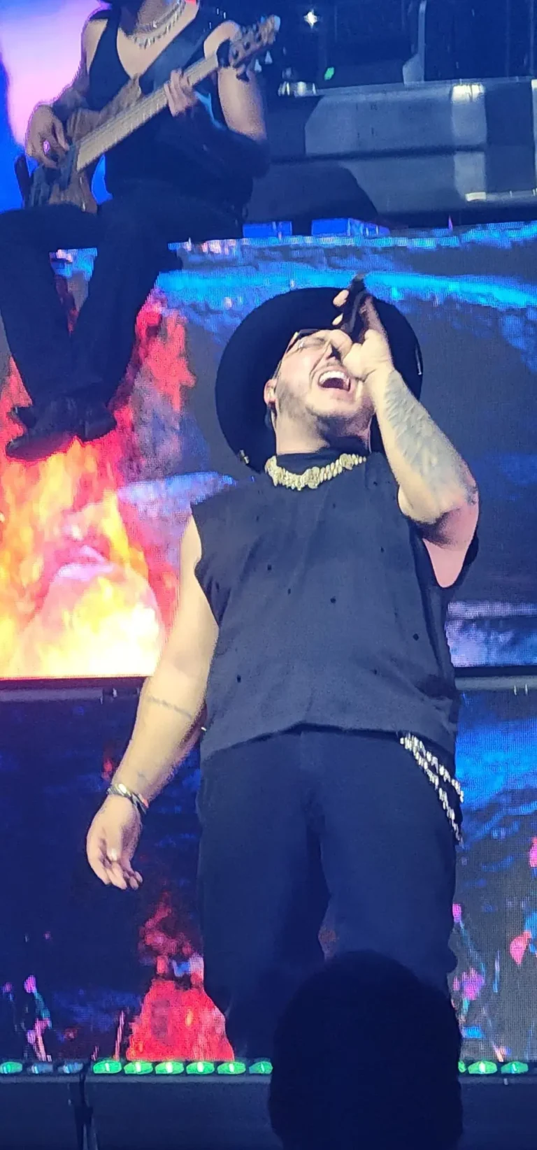 a man singing into a microphone