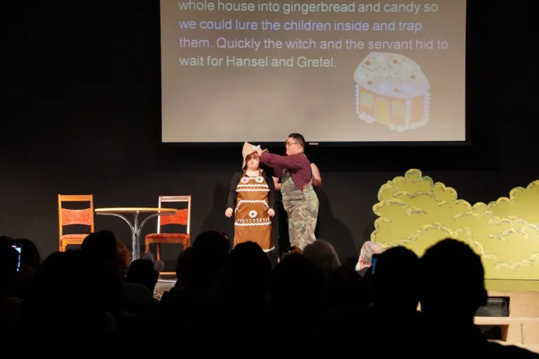 a man and woman on stage